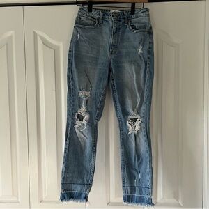 Women's Distressed Blue Jeans